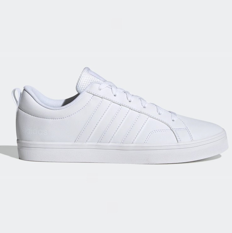 White Adidas Vs Pace 2.0 sneakers feature the brand's signature three stripes, a flat sole, and a logo on the heel tab.