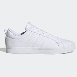 White Adidas Vs Pace 2.0 sneakers feature the brand's signature three stripes, a flat sole, and a logo on the heel tab.