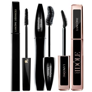 Three full-size Lancôme mascaras, each with different brush designs for varying lash effects, are displayed with the wands removed for viewing.