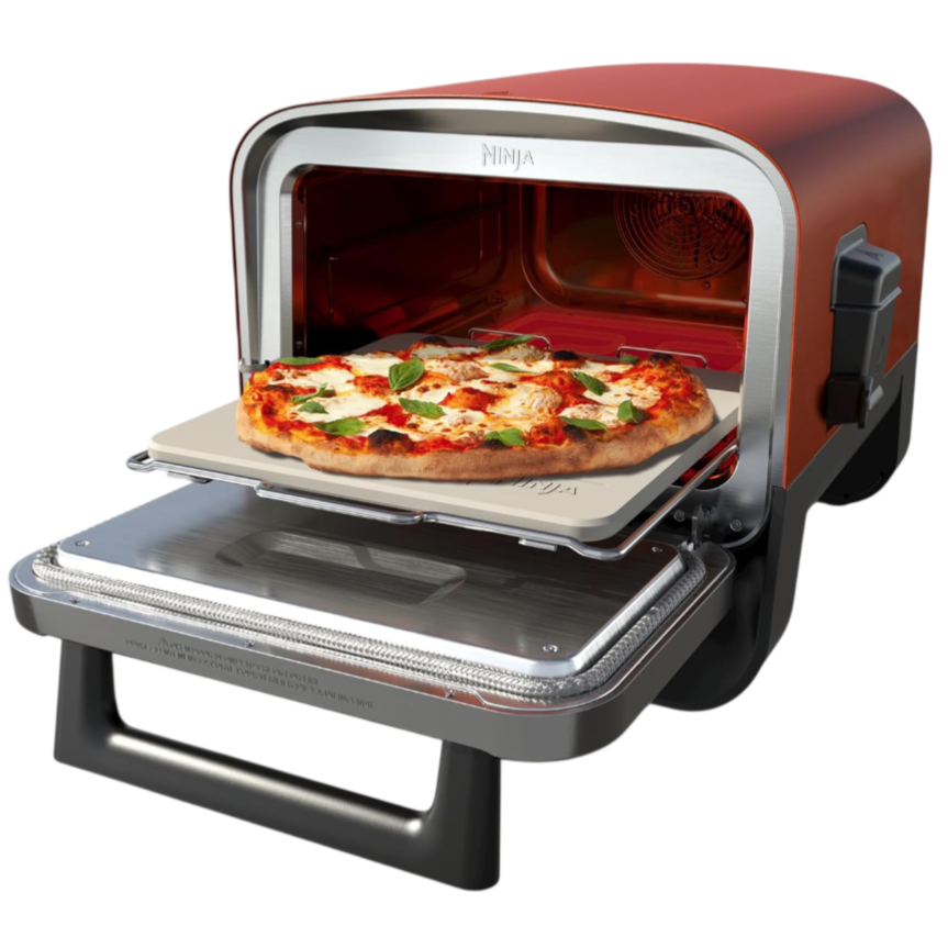 A countertop pizza oven with a modern design is baking a pizza on a stone tray. The oven has a sleek, compact build with visible controls and a fan at the back for convection cooking.