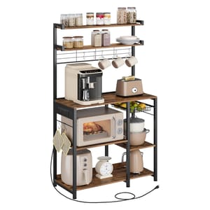 A kitchen storage rack with multiple shelves holds various items including jars, dishes, a coffee machine, toaster, microwave with a chicken inside, air fryer, scale, and pots. The rack also features hooks for mugs and pot holders.