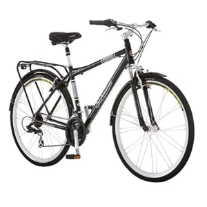 A black Schwinn hybrid bicycle with front suspension, fenders, a rear rack, and multiple gears.