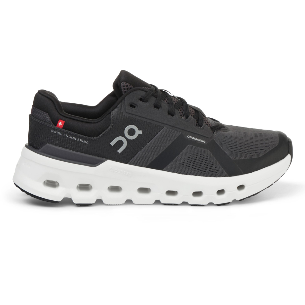 Running shoe with black mesh upper, branded \“On Running.\“ Features include Swiss engineering, white CloudTec sole with visible cushioning, and lace-up closure.