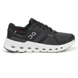 Running shoe with black mesh upper, branded \“On Running.\“ Features include Swiss engineering, white CloudTec sole with visible cushioning, and lace-up closure.