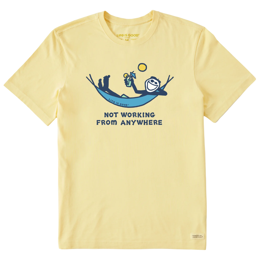 A yellow T-shirt with a graphic of a person relaxing in a hammock, holding a drink, and the text \“NOT WORKING FROM ANYWHERE.\“