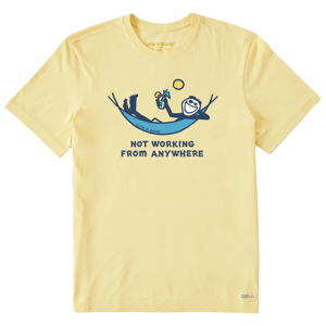 A yellow T-shirt with a graphic of a person relaxing in a hammock, holding a drink, and the text \“NOT WORKING FROM ANYWHERE.\“