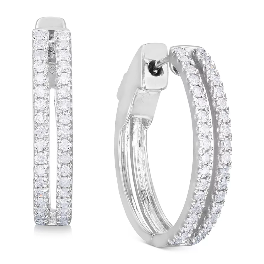 A pair of silver hoop earrings encrusted with small round diamonds along the outer edge.