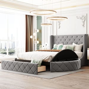 Luxurious bedroom featuring a gray upholstered bed with a tufted headboard, underbed storage drawers, and elegant circular pendant lights. Large window with city view and modern floor lamp enhance the room's sophisticated style.