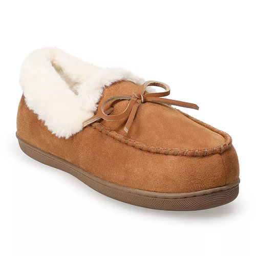 A brown moccasin-style slipper with a faux fur lining and a bow on top, designed for indoor comfort.