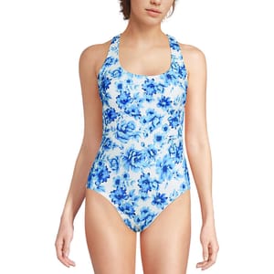One-piece swimsuit with a blue floral print on a white background, featuring a scoop neckline and racerback design.