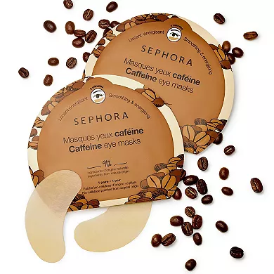 Two Sephora caffeine eye masks with packaging that mimics coffee beans, alongside scattered coffee beans and a pair of under-eye patches.