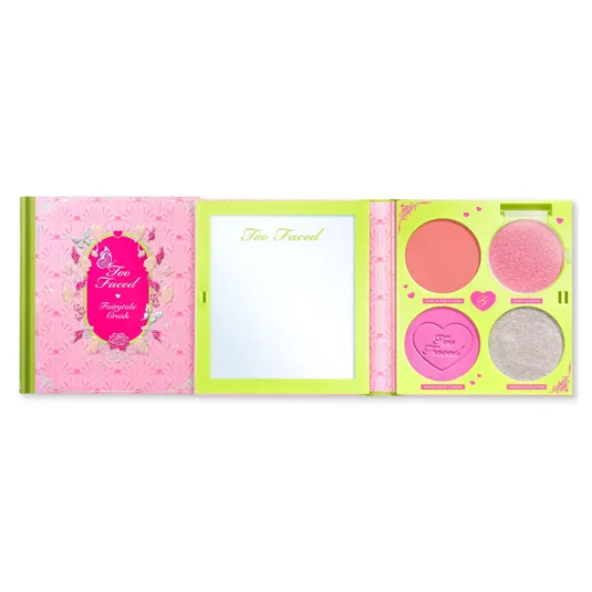 Too Faced Fairytale Crush palette includes four makeup pans: \“Head in the Clouds,\“ \“Candy Clouds,\“ \“Super Candy Clouds,\“ and \“Happily Ever After,\“ featuring blush and highlight shades with a decorative pink and green design.