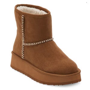 Brown suede ankle boot with a thick sole, white stitching accents, and a plush, fur-lined interior.