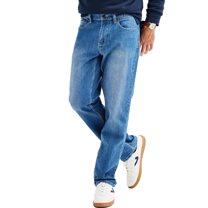 Relaxed-fit jeans with a light blue wash, featuring a classic five-pocket style and a straight-leg cut, paired with white sneakers.