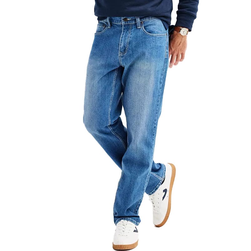 Relaxed-fit jeans with a light blue wash, featuring a classic five-pocket style and a straight-leg cut, paired with white sneakers.