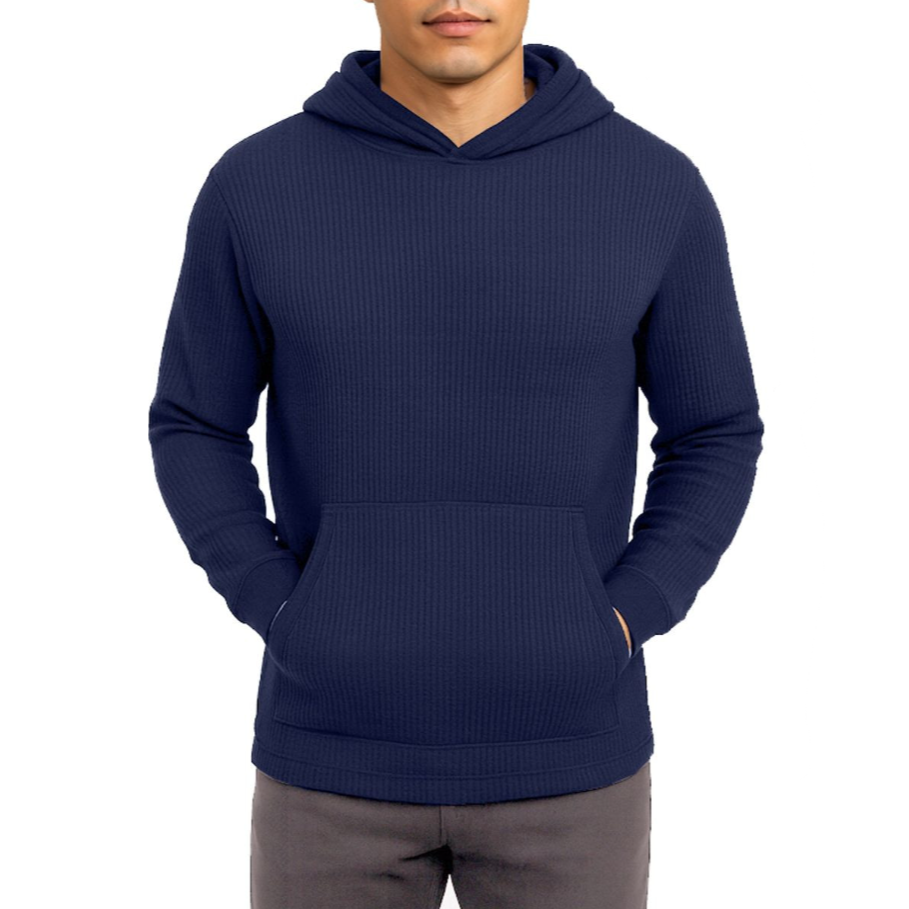 A man is wearing a navy blue, ribbed hooded sweatshirt with a front pouch pocket, paired with gray pants.