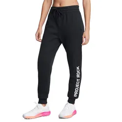 Black joggers with \“Project Rock\“ text on the leg, paired with white sneakers featuring pink accents.