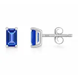Rectangular blue gemstone stud earrings set in silver, marked with \“925\“ indicating sterling silver.
