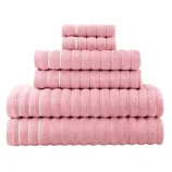 A stack of pink towels in various sizes, featuring a textured pattern with white stripes.