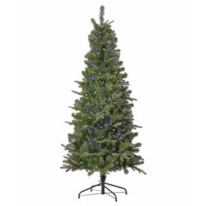 An artificial Christmas tree with multi-colored lights, featuring a metal stand.