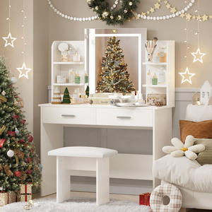 A white vanity set with a mirror and shelves is adorned with beauty products and surrounded by festive Christmas decorations, including a tree with gold baubles, star lights, and wreaths, creating a cozy holiday atmosphere.