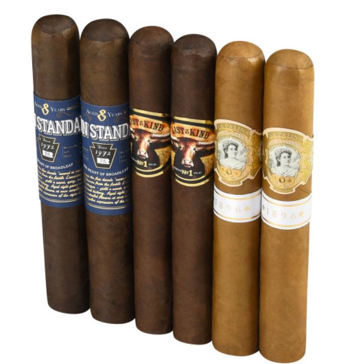 Six cigars with various colored wrappers and distinctive labels are shown side by side.