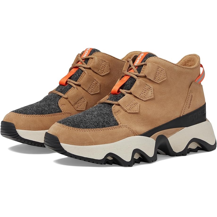 A pair of brown and gray sneakers with chunky soles and orange accents.