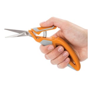 Fiskars Precision Scissors feature an ergonomic orange and gray handle with a spring-loaded mechanism for reduced hand strain, ideal for detailed cutting tasks.