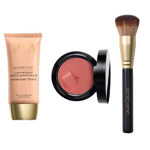 Laura Geller makeup set featuring a lightweight tinted moisturizer, a blush in a circular compact, and a makeup brush with a gold and black handle.