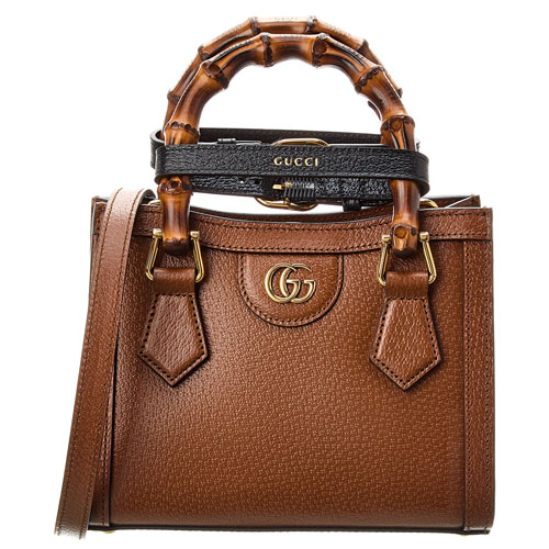 Brown Gucci leather handbag with bamboo handles and gold-tone logo.