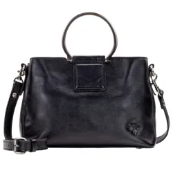 A black leather handbag with circular metal handles and a detachable shoulder strap, featuring a small embossed floral detail.