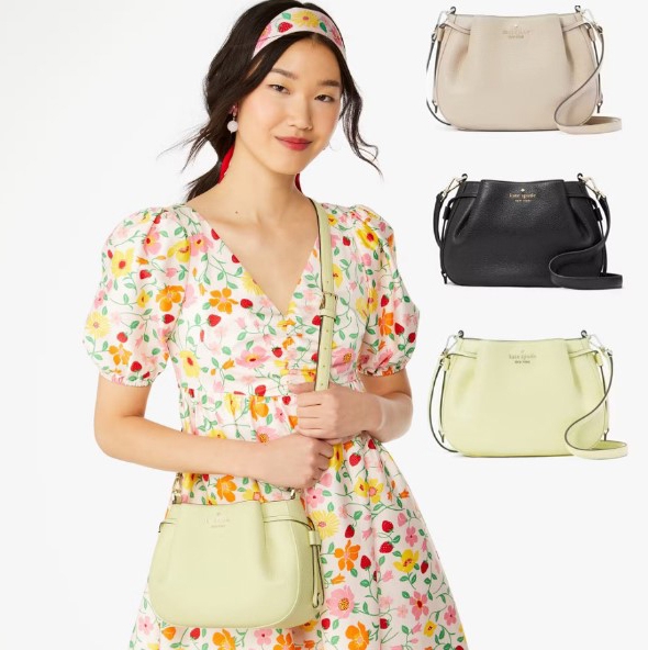 A woman is wearing a floral dress and holding a light green crossbody bag, with three different colored bags displayed beside her.