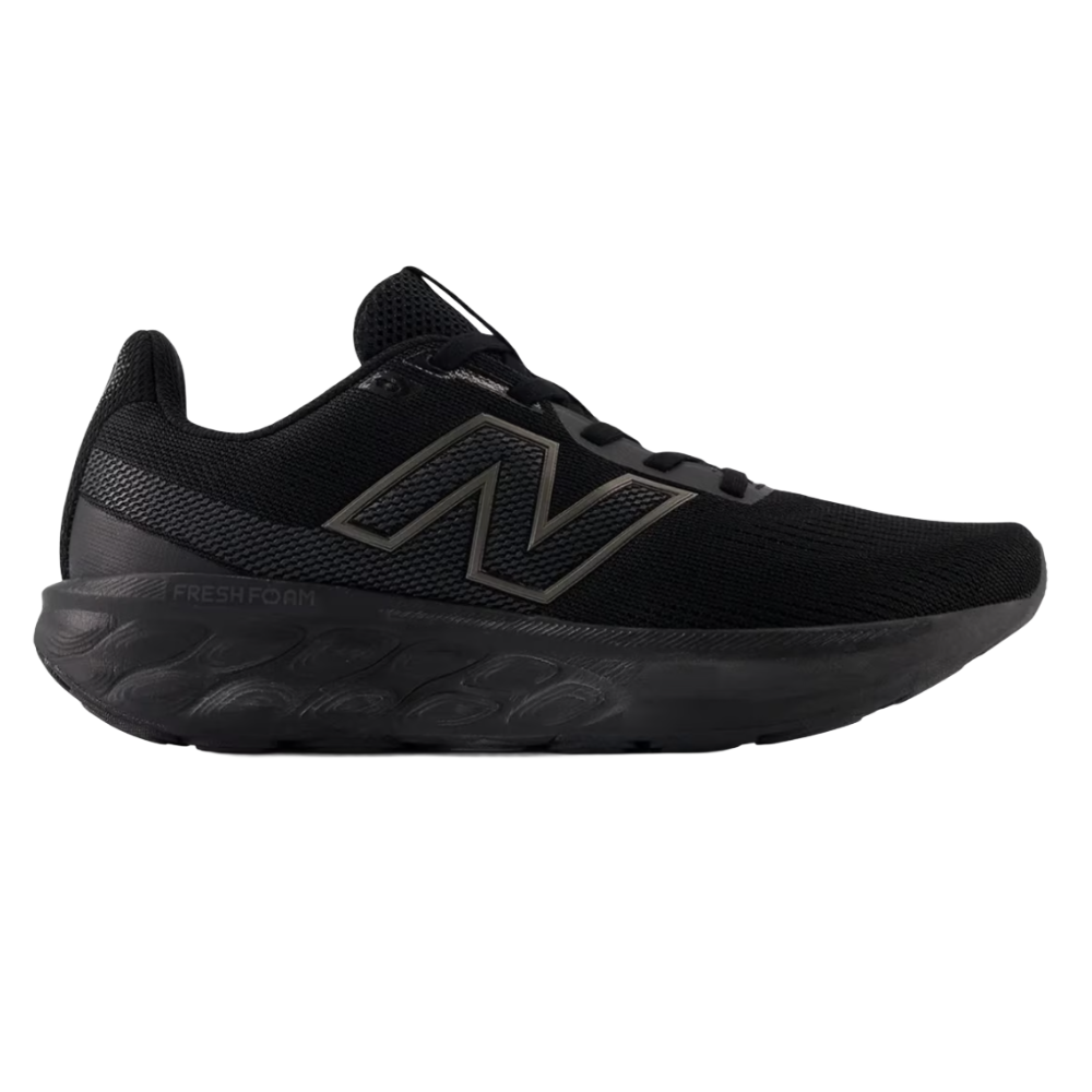 Black sneaker with Fresh Foam midsole, featuring a mesh upper and New Balance logo.