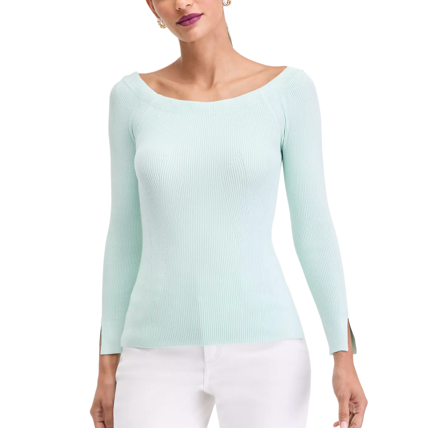 A light mint green ribbed knit sweater with a wide neckline and three-quarter sleeves is paired with white pants.
