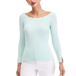 A light mint green ribbed knit sweater with a wide neckline and three-quarter sleeves is paired with white pants.