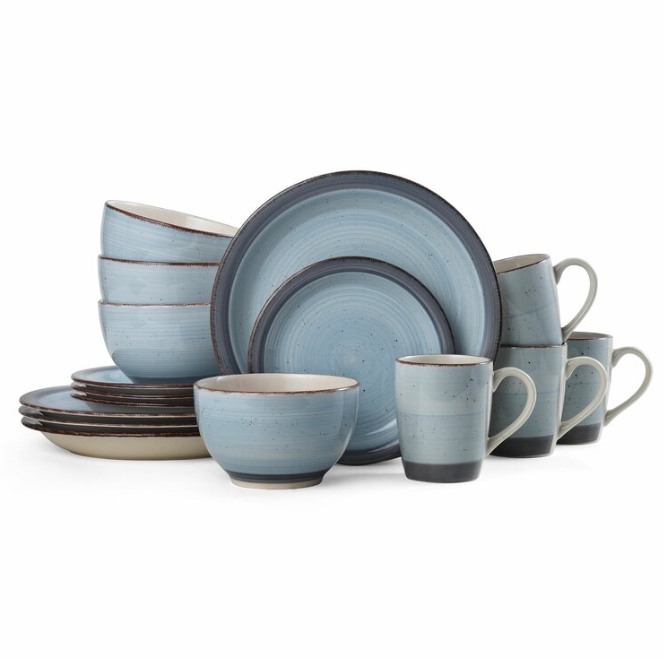 The Pfaltzgraff 16-piece Stoneware Dinner Set includes four dinner plates, four salad plates, four bowls, and four mugs, all in a speckled blue design with a rustic, dark rim.