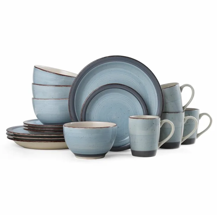The Pfaltzgraff 16-piece Stoneware Dinner Set includes four dinner plates, four salad plates, four bowls, and four mugs, all in a speckled blue design with a rustic, dark rim.