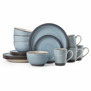 The Pfaltzgraff 16-piece Stoneware Dinner Set includes four dinner plates, four salad plates, four bowls, and four mugs, all in a speckled blue design with a rustic, dark rim.