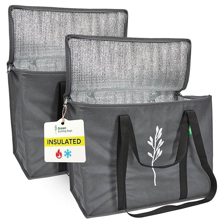Two gray, insulated grocery bags with black handles and open tops, featuring reflective inner linings and a leaf design. They are labeled \“INSULATED\“ for maintaining temperature.