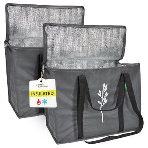 Two gray, insulated grocery bags with black handles and open tops, featuring reflective inner linings and a leaf design. They are labeled \“INSULATED\“ for maintaining temperature.