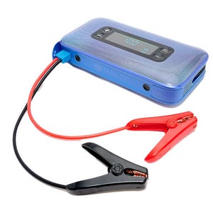 The HALO Bolt Ultimate Jumpstarter is a portable battery pack featuring a digital display, control buttons, and red and black clamp cables for jumpstarting vehicles.