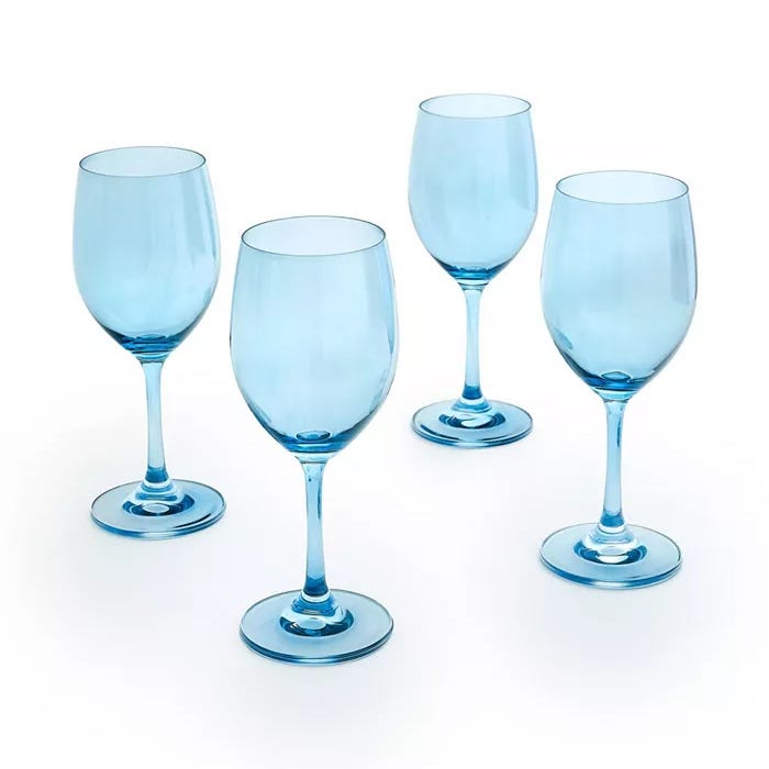 Four light blue wine glasses with sleek, elegant stems designed for white wine. They have a classic shape and each glass rests on a wide, stable base.