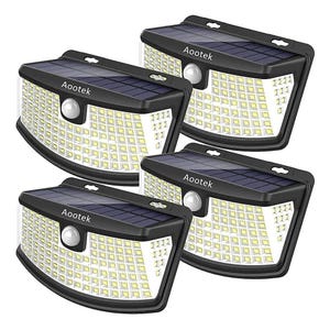 Four Aootek solar-powered motion-sensor security lights with LED panels, black casing, and mounted motion detectors for outdoor use.