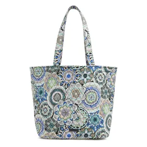 A tote bag with a colorful mandala pattern.