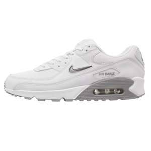 Nike Air Max 90 white sneaker with a visible air unit, featuring a white and gray color scheme and a swoosh logo on the side.