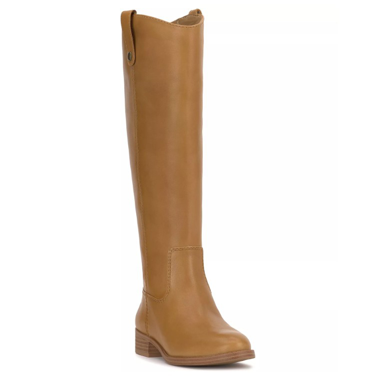 A tan knee-high boot with a low block heel and side pull tab, featuring smooth leather and decorative stitching.