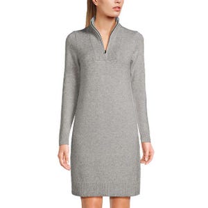 Gray knit sweater dress with long sleeves and a quarter-zip neckline, featuring ribbed cuffs and hem.