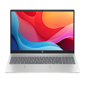 Silver HP laptop with a colorful abstract wallpaper on the screen and a full keyboard with numeric keypad.