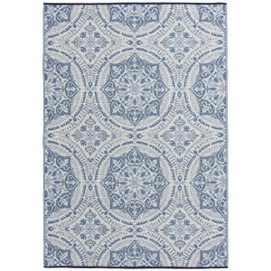 A 5' x 7' outdoor rug with a blue and white intricate geometric and floral pattern, featuring circular and diamond shapes for a decorative touch.