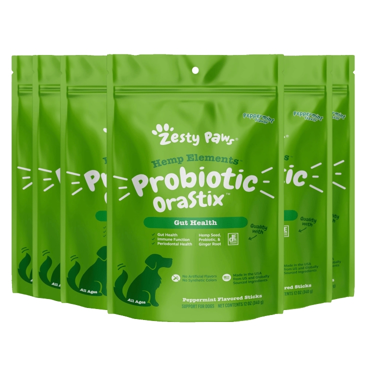 Three green packets of Zesty Paws Probiotic Stix, peppermint flavored, for supporting dog gut health.